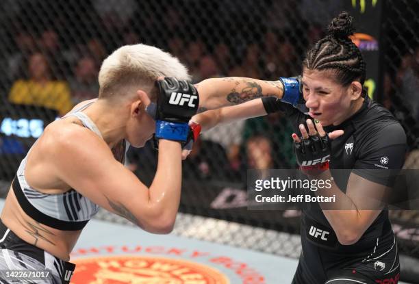 Macy Chiasson punches Irene Aldana of Mexico in a 140-pound catchweight fight during the UFC 279 event at T-Mobile Arena on September 10, 2022 in Las...