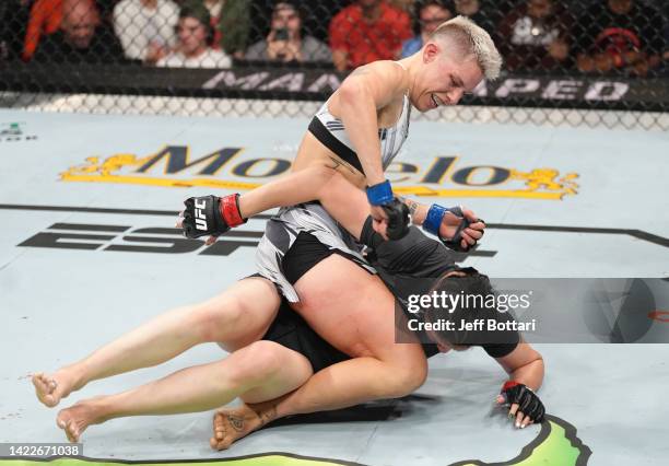 Macy Chiasson punches Irene Aldana of Mexico in a 140-pound catchweight fight during the UFC 279 event at T-Mobile Arena on September 10, 2022 in Las...