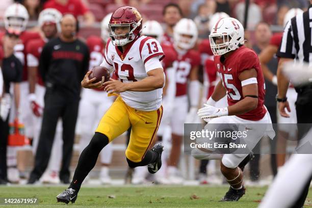 Caleb Williams of the USC Trojans runs with the ball the ball against the Stanford Cardinal at Stanford Stadium on September 10, 2022 in Stanford,...