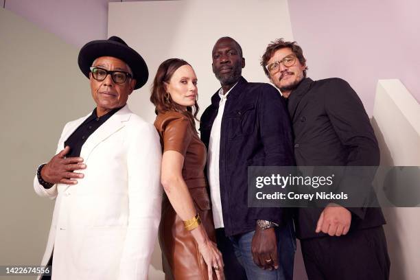 Giancarlo Esposito, Emily Swallow, Rick Famuyiwa, and Pedro Pascal pose at the IMDb Official Portrait Studio during D23 2022 at Anaheim Convention...