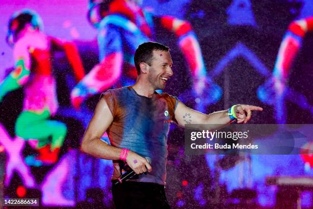 Chris Martin of the band Coldplay performs at the Mundo Stage during the Rock in Rio Festival at Cidade do Rock on September 10, 2022 in Rio de...