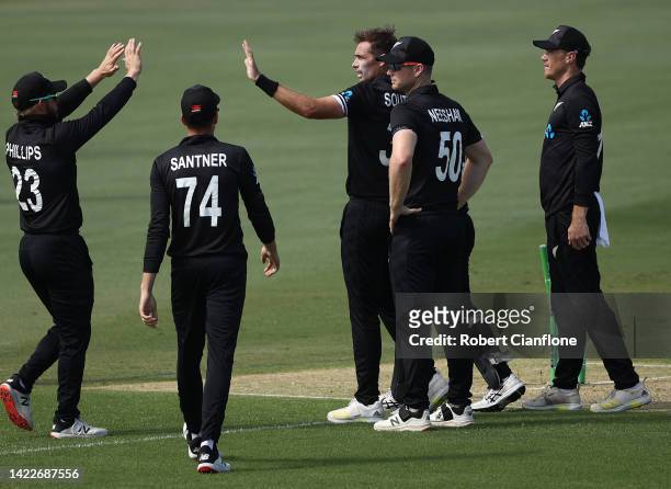 Tim Southee of New Zealand celebrates taking the wicket of Aaron Finch of Australia during game three of the One Day International Series between...