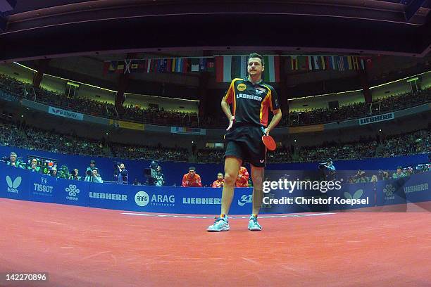 Timo Boll of Germany looks dejected during the LIEBHERR table tennis team world cup 2012 championship division men's final match between China and...