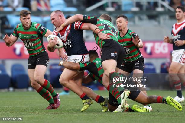 Matthew Lodge of the Roosters is tackled during the NRL Elimination Final match between the Sydney Roosters and the South Sydney Rabbitohs at Allianz...