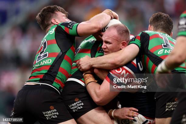 Matthew Lodge of the Roosters is tackled during the NRL Elimination Final match between the Sydney Roosters and the South Sydney Rabbitohs at Allianz...