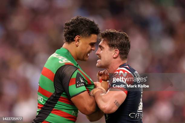 Latrell Mitchell of the Rabbitohs scuffles with Connor Watson of the Roosters during the NRL Elimination Final match between the Sydney Roosters and...
