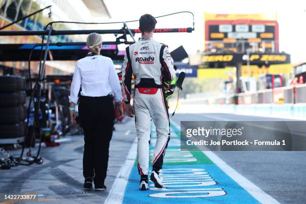 Theo Pourchaire of France and ART Grand Prix walks in the Pitlane after crashing out during the Round 13:Monza Feature race of the Formula 2...