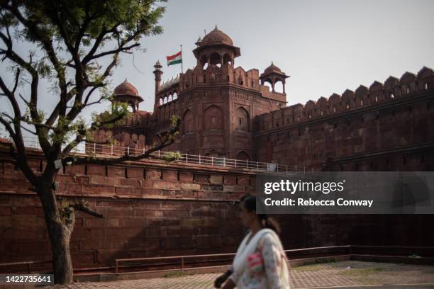 The Indian national flag flies at half-mast over the Red Fort at the start of a day of mourning to mark the death of Queen Elizabeth II on September...