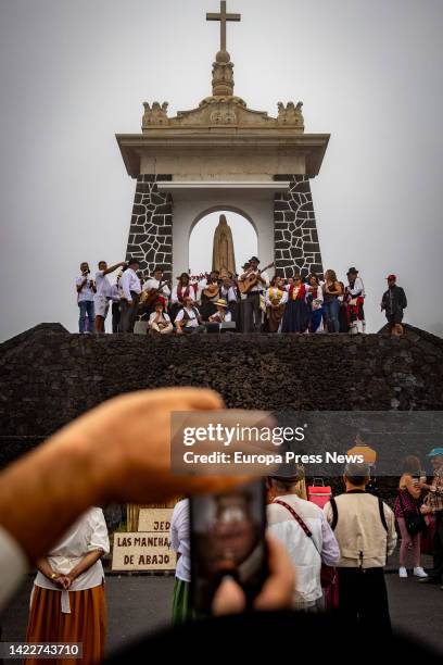 Residents of the neighborhood of Las Manchas next to the Virgen de la Romeria de San Nicolas Neri, on 10 September, 2022 in El Paso, La Palma, Canary...