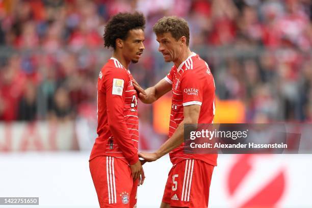 Thomas Müller of Bayern München reacts to his team mate Leroy Sane during the Bundesliga match between FC Bayern München and VfB Stuttgart at Allianz...