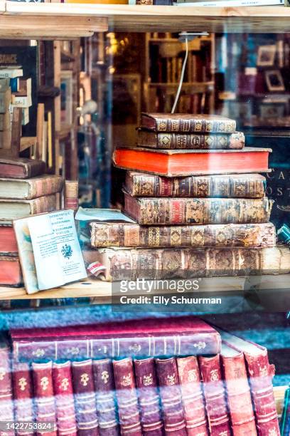 book shop in france - old book cover stock pictures, royalty-free photos & images