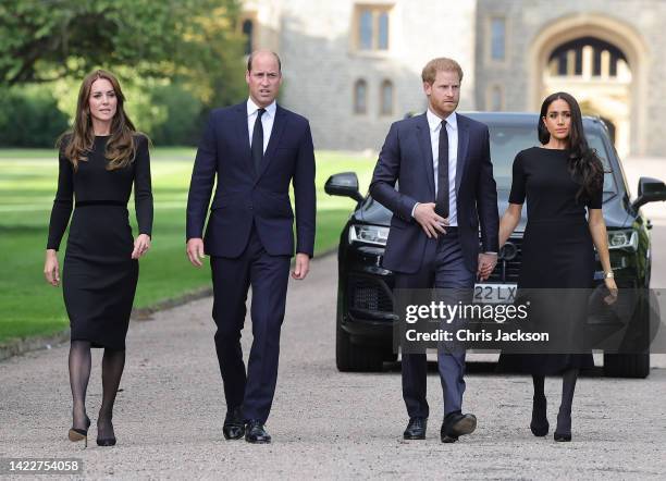 Catherine, Princess of Wales, Prince William, Prince of Wales, Prince Harry, Duke of Sussex, and Meghan, Duchess of Sussex on the long Walk at...