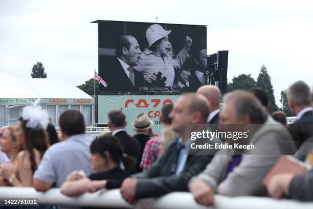 General view as an LED board inside the racecourse displays a tribute to Her Majesty Queen Elizabeth II, who died away at Balmoral Castle on...