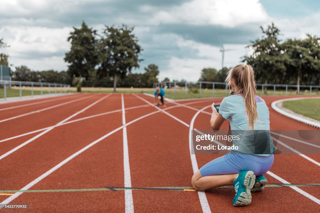 Working Hard Running Two Athletic Children Working Hard On The Running Track High-Res Stock ...