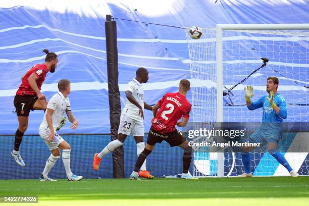 Vedat Muriqi of RCD Mallorca scores their side's first goal during the LaLiga Santander match between Real Madrid CF and RCD Mallorca at Estadio...