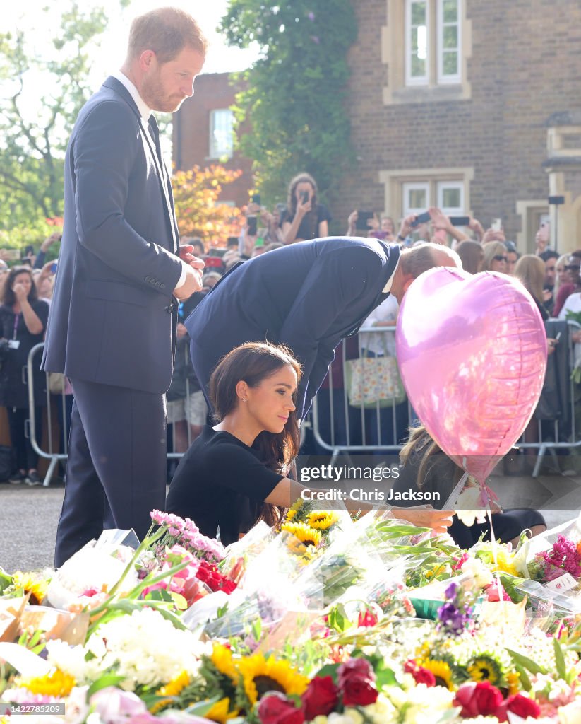 The Prince and Princess of Wales Accompanied By The Duke And Duchess Of Sussex Greet Wellwishers Outside Windsor Castle