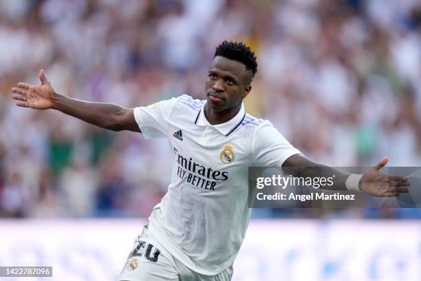 Vinicius Junior of Real Madrid CF celebrates after scoring their side's second goal during the LaLiga Santander match between Real Madrid CF and RCD...