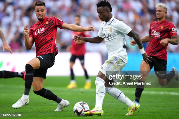 Vinicius Junior of Real Madrid CF celebrates after scoring their side's second goal during the LaLiga Santander match between Real Madrid CF and RCD...