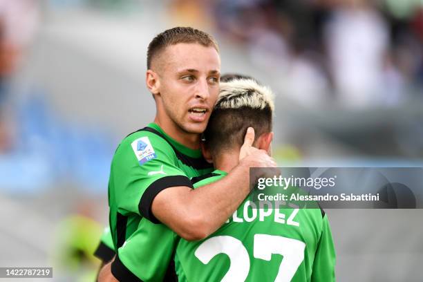 Davide Frattesi of US Sassuolo celebrates with teammate Maxime Lopez after scoring their team's first goal during the Serie A match between US...