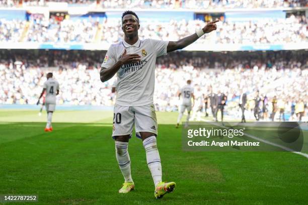 Vinicius Junior of Real Madrid CF celebrates after scoring their side's second goal during the LaLiga Santander match between Real Madrid CF and RCD...