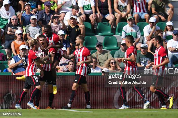 Oihan Sancet of Athletic Club celebrates with teammates after scoring their team's second goal from the penalty spot during the LaLiga Santander...