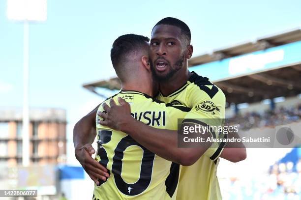 Beto of Udinese Calcio celebrates with teammate Ilija Nestorovski after scoring their team's third goal during the Serie A match between US Sassuolo...