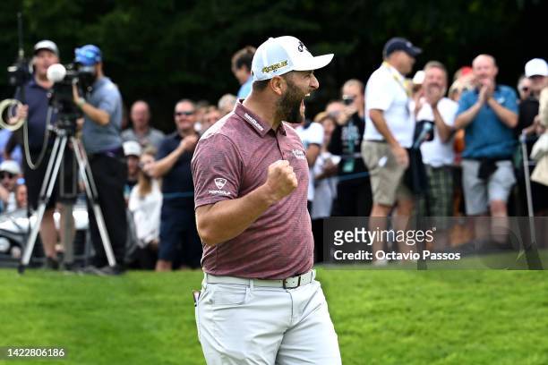 Jon Rahm of Spain celebrates after sinking an eagle putt on the 18th hole during Round Three on Day Four of the BMW PGA Championship at Wentworth...
