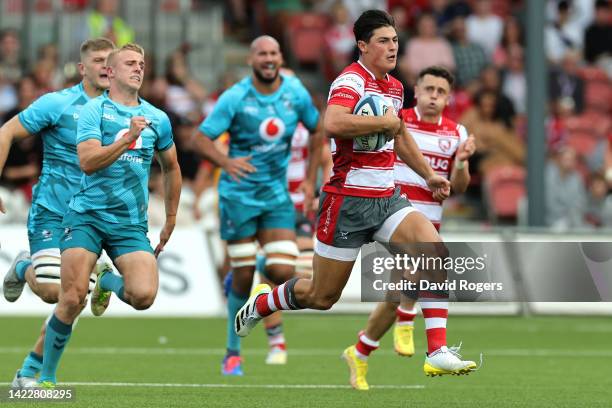 Ali Crossdale of Wasps Rugby chases Louis Rees-Zammit of Gloucester Rugby as they break free to score their side's first try during the Gallagher...