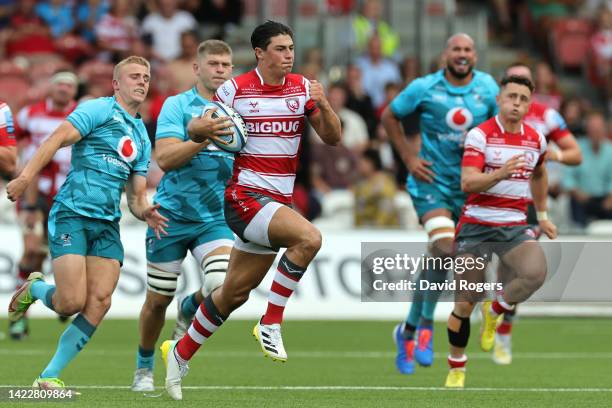 Louis Rees-Zammit of Gloucester Rugby breaks free of the Wasps Rugby defence to score their side's first try of the match during the Gallagher...