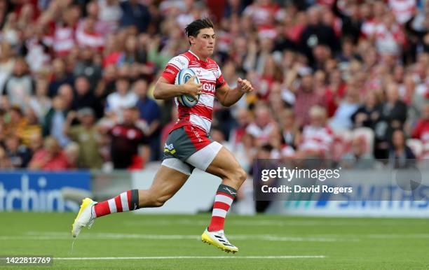 Louis Rees-Zammit of Gloucester breaks clear to score their first try after making a solo break during the Gallagher Premiership Rugby match between...