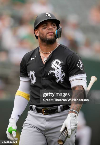 Yoan Moncada of the Chicago White Sox looks on walking back to the dugout after striking out against the Oakland Athletics in the top of the fifth...