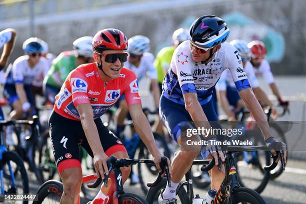 Remco Evenepoel of Belgium and Team Quick-Step - Alpha Vinyl - Red Leader Jersey and Christopher Froome of United Kingdom and Team Israel - Premier...