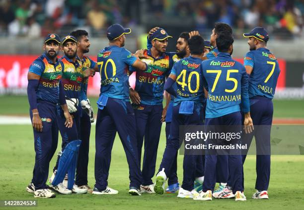 Players of Sri Lanka celebrates the wicket of Babar Azam of Pakistan during the DP World Asia Cup Final match between Pakistan and Sri Lanka at Dubai...