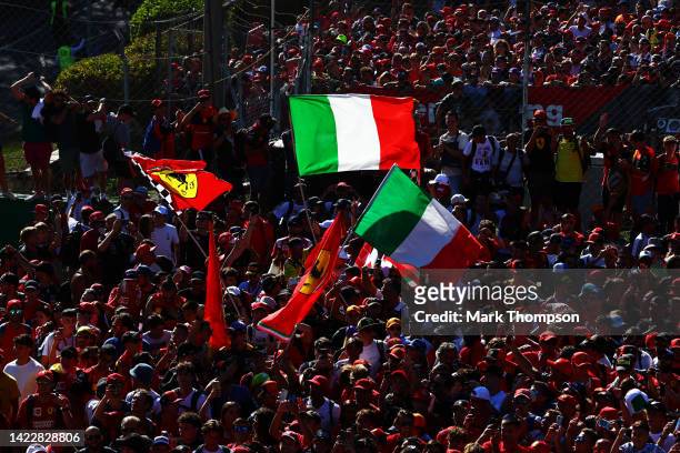 Ferrari fans show their support with flags during the F1 Grand Prix of Italy at Autodromo Nazionale Monza on September 11, 2022 in Monza, Italy.