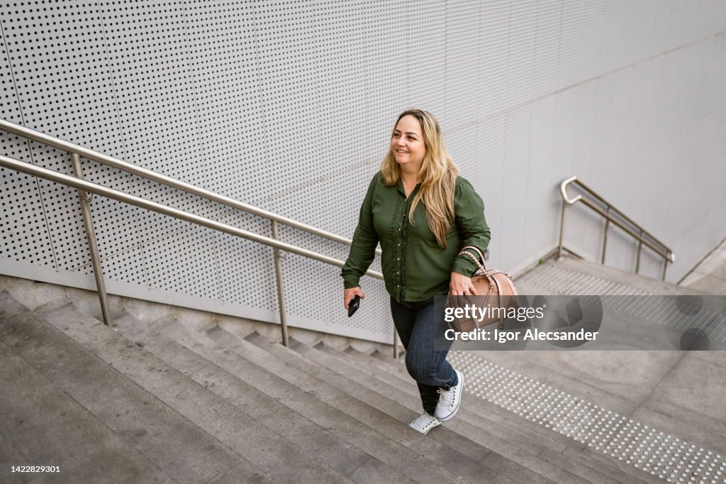 Woman on the way in the financial district