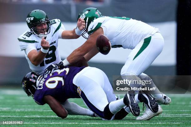 Joe Flacco of the New York Jets called for intentional grounding after being pressured by Calais Campbell of the Baltimore Ravens at MetLife Stadium...