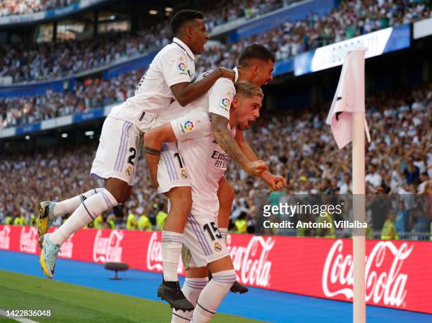 Federico Valverde player of Real Madrid celebrates with his teammates after scoring a goal during the LaLiga Santander match between Real Madrid CF...