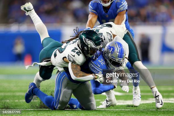 Marcus Epps of the Philadelphia Eagles tackles D'Andre Swift of the Detroit Lions during the first half at Ford Field on September 11, 2022 in...