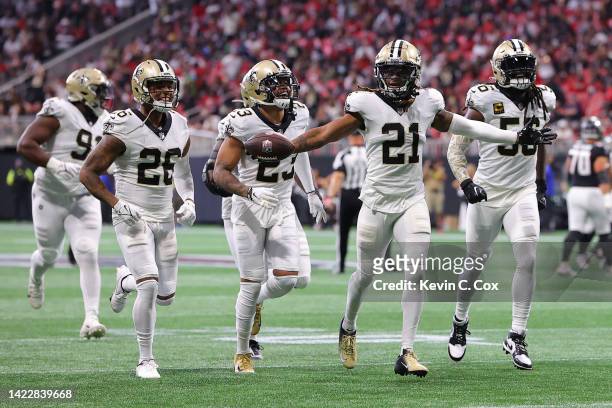 Cornerback Bradley Roby of the New Orleans Saints celebrates after recovering a fumble during the first half against the Atlanta Falcons at...
