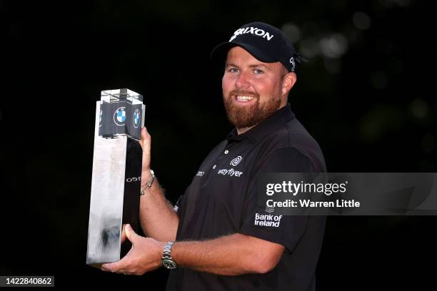 Shane Lowry of Ireland poses for a photograph with the BMW PGA Championship trophy after winning the tournament during Round Three on Day Four of the...