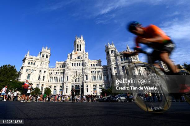 Rider competing passing through the Plaza Cibeles with the Palacio de Cibeles - Ayuntamiento de Madrid in the background during the 77th Tour of...