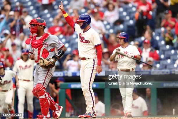 Rhys Hoskins of the Philadelphia Phillies reacts after scoring during the first inning against the Washington Nationals at Citizens Bank Park on...