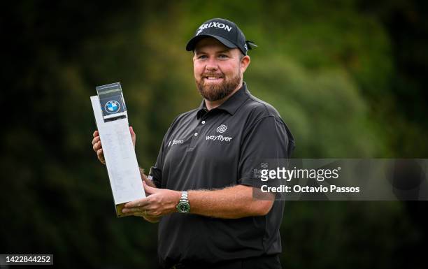 Shane Lowry of Ireland poses for a photograph with the BMW PGA Championship trophy after winning the tournament during Day Four of the BMW PGA...