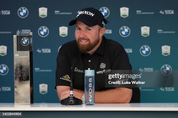 Shane Lowry of Ireland speaks to the media with the BMW PGA Championship trophy after winning the tournament during Round Three on Day Four of the...