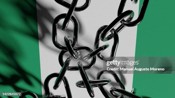 chained flag of nigeria - argentina vs nigeria stock pictures, royalty-free photos & images