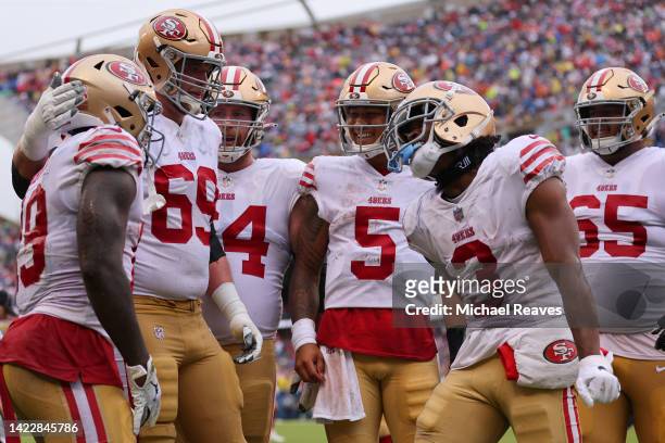 Wide receiver Deebo Samuel of the San Francisco 49ers celebrates with teammates after a touchdown during the first quarter against the Chicago Bears...