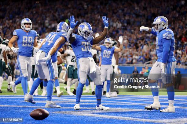 Jamaal Williams of the Detroit Lions celebrates with teammates after scoring a touchdown during the first quarter against the Philadelphia Eagles at...