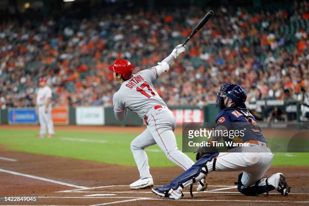 Shohei Ohtani of the Los Angeles Angels hits a two-run home run in the first inning against the Houston Astros at Minute Maid Park on September 11,...