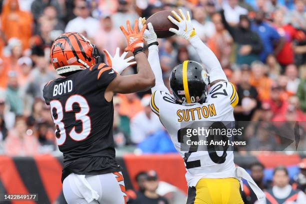 Cornerback Cameron Sutton of the Pittsburgh Steelers intercepts a pass intended for wide receiver Tyler Boyd of the Cincinnati Bengals during the...