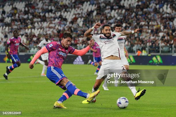 Dusan Vlahovic of Juventus shot is blocked by Dylan Bronn of Salernitana during the Serie A match between Juventus and Salernitana at on September...